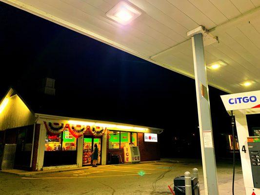 Gas pump loudly advertises during the fill-up, interrupting the night driving groove