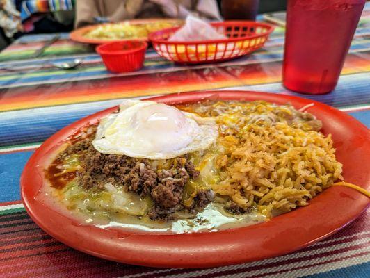 Christmas enchiladas de res with an egg; those beans and rice are not mere side notes, either.