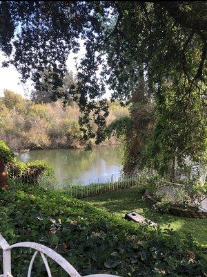 View of the river and part of the reception area from the bridal cottage. Wedding 10/21/23