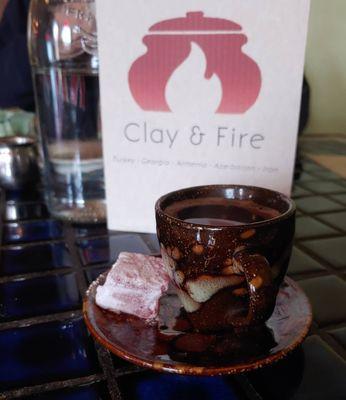 Turkish-style coffee, kissed with cardamom and a Turkish delight on the side. Yum!