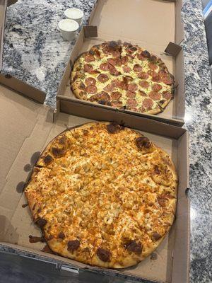 Buffalo chicken and Pesto pepperoni pizzas