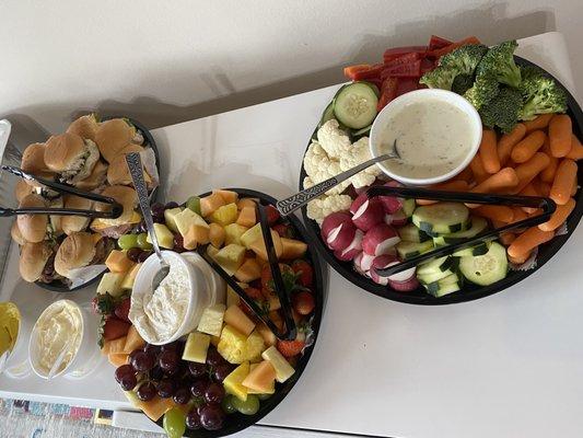 Fruit and veggie trays and sandwiches from catering