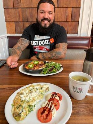 Hubby enjoy his new found love dish  Lobster Eggs Benedict.