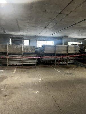 Our parking garage has turned into storage for scaffolding