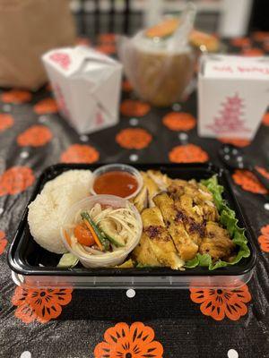 This is the bbq chicken (gai yang) it comes with a small side of sticky rice and papaya salad. Yum!  We took it to go home.