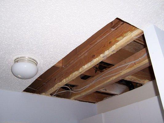 Opened up water damaged ceiling in a customer's home starting the repair process