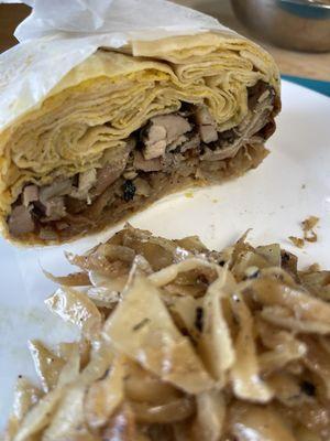 Jamaican jerk chicken roti wrap with extra cabbage.