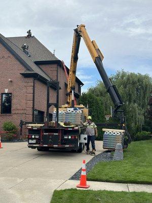 Roofing project has begun, dropping off material. Our entire tear off & NEW roof is completely covered by our insurance, due to hail damage