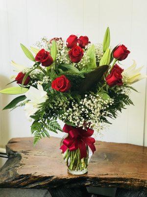 Doesn't have to be Valentines day to order your loved on classic red roses that never fall out of style. Call us today to order!