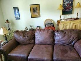 Deformed, uncomfortable $1000.00 couch.