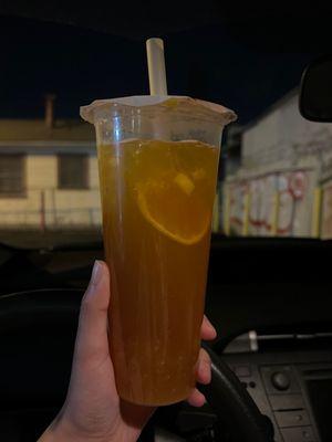 Mango fruit tea with popping boba