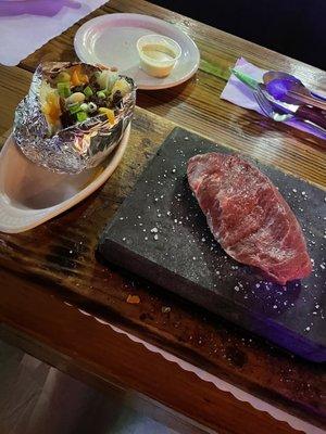 Steak on a hot stone. Extremely tender. Have to get this again!