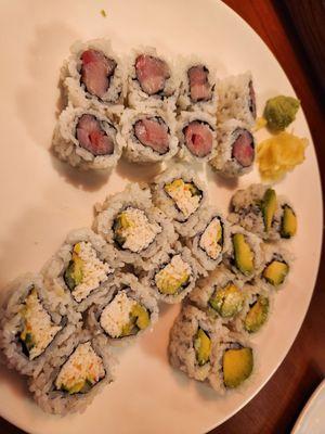 Yellow tail roll, California roll and avocado roll.