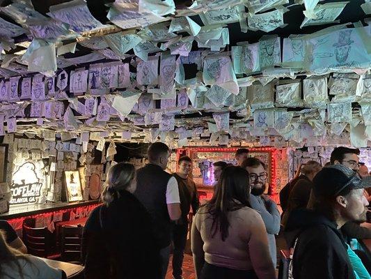 Bar area covered in drawings of Abe Lincoln