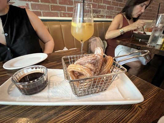 White sangria and Churros con chocolate