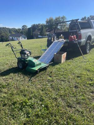 A brush hog mower that cleared a 1/5th acre with ease.