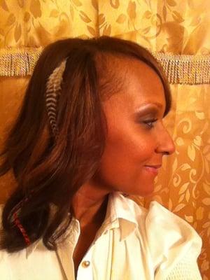 Hair done by Desire. Check out my feather. }|{