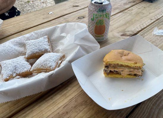 Smash burger, beignets, and a pineapple soda.