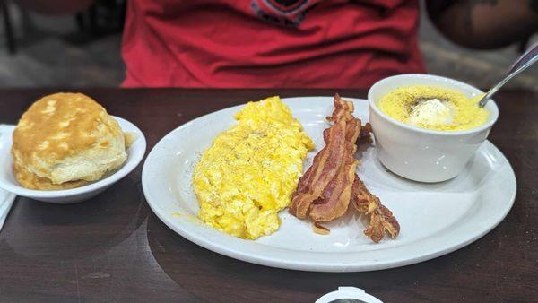 American with cheese eggs, grits, bacon and a grilled biscuit with butter in the middle. Very filling