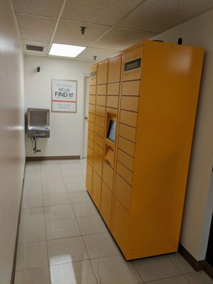 Amazon Locker Tremont near the restrooms in the back of the store.