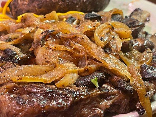 Bone-in Ribeye smothered w/ mushrooms and onions