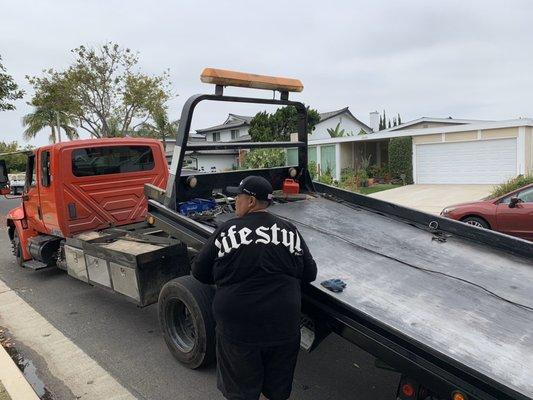 Owner out towing Motercycle