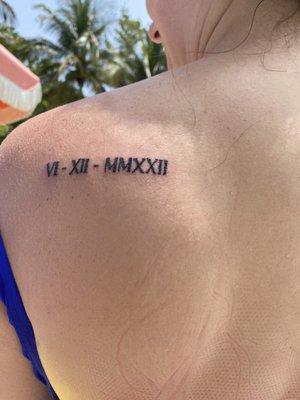 By Alex  Our wedding date in Roman numerals We love it!!!