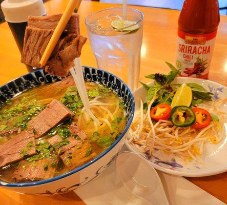 My crane operator lifting 2 slabs of Beef Brisket for this photo!  Brisket Pho, if ya Know, ya know!