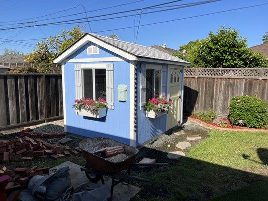 Before lack of landscaping around shed