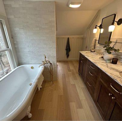 Master bathroom remodel in an old farmhouse. Love that tile on the outside of the shower too! And that tub!