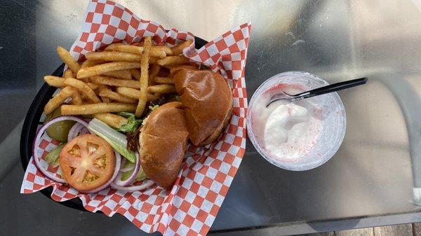 Bacon avocado burger with fries, and strawberry smoothie