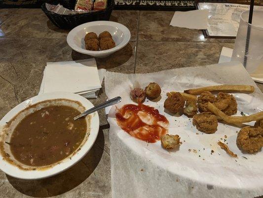 Red beans and rice with fried shrimp, hush puppies &french fries.(i left this there no worth taking to go)