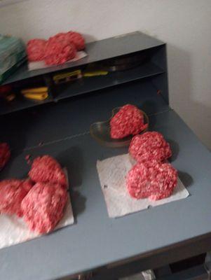 Ground beef being left out in common area next to break room and restroom. Reaching dangerous temperatures with no testing standards