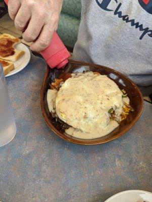 OMG skillet (sausage gravy, fresh jalapeno, eggs and hash browns.  I know where it got it's name!  OMG DELISH!