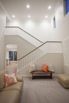 Stair case refinish and custom lighting features