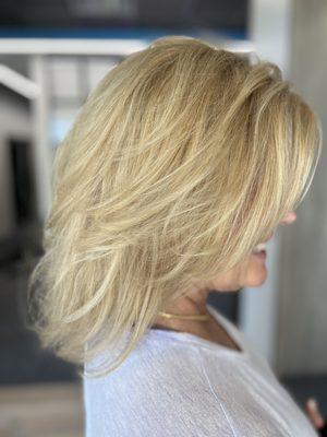 Beige blonde with long layers cut