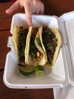 Chicken, carnitas, and steak tacos on flour tortillas