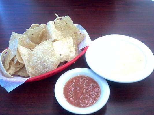 A very unique Queso, homemade salsa and chips. Yummy