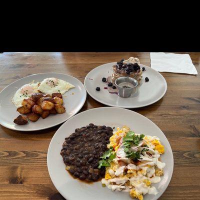 Sourdough pancakes, Migas w beans and a side of eggs over easy w potatoes