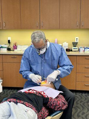 Getting his braces put on by Dr. B