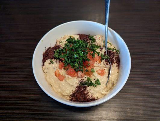 Smooth baba ghanouj was topped with chopped tomatoes, and parsley/mint.