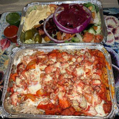 Chicken over rice & 3 sides above: black beans, hummus, and chickpeas. Mixed salad as well