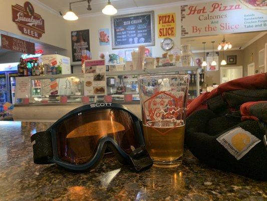 A snowy four wheeler ride for a good local beer.