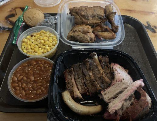 Round up: ribs, half chicken, brisket with cajun corn, bbq beans, cornbread muffin.