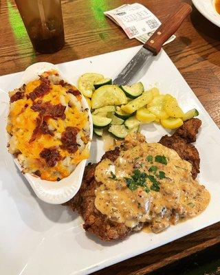 Country-fried steak w loaded mashed potatoes. Delicious!