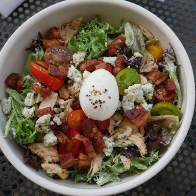 Cob Salad with thick cut bacon and a poached egg