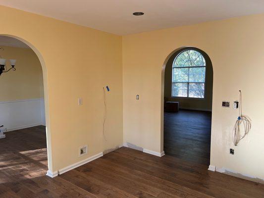 We had the kitchen demo'd, then Etowah installed the floors (and the kitchen cabinets were installed later.)