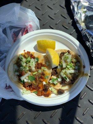 1 carne asada taco and 1 al pastor taco