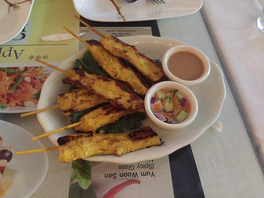 Chicken satay with side of peanut sauce