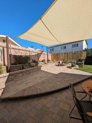 Beautiful quality custom shade sail in my yard, "natural" color.